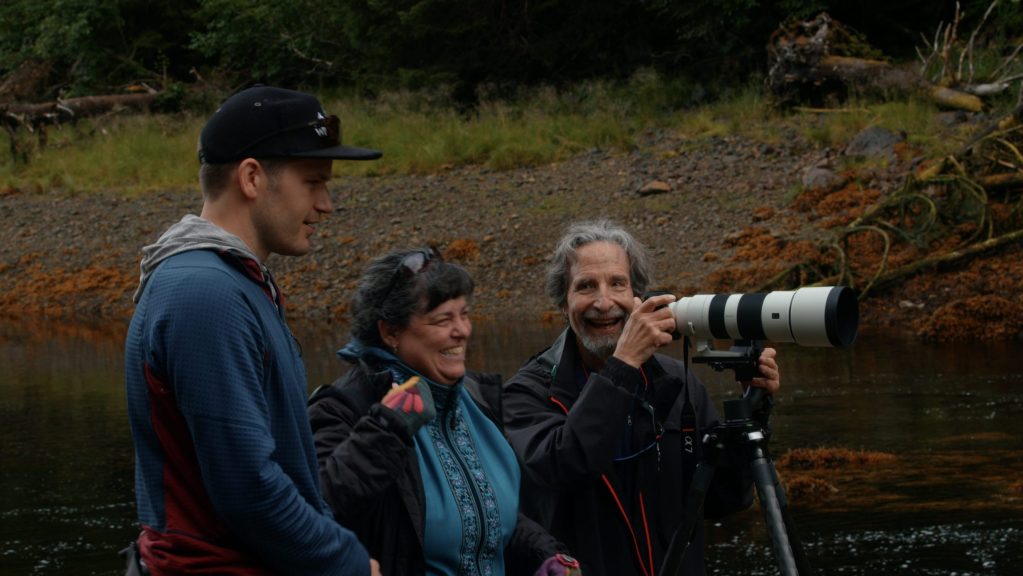 Wildlife photographers capturing brown bears on private Alaska bear viewing tour with Wild Coast Excursions in Juneau, Alaska. 
